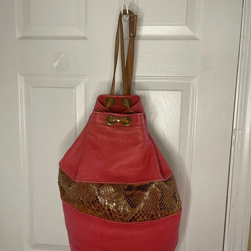 Leather orange and Brown snake skin print  Xlarge bucket bag sling back tan trap